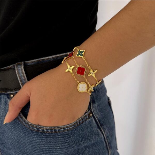 PULSEIRA TREVOS  E  ESTRELA 4 PONTAS BANHADO A OURO (03010517)